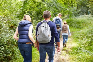 Family On Walk Through Beautiful Countryside