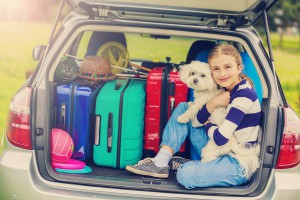 Summer vacation, young girl ready for travel