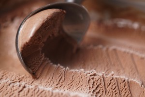 scooping chocolate ice cream close up shot