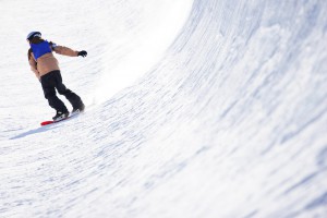 Snowboarder in halfpipe